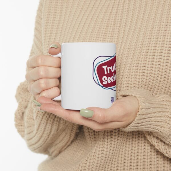 Truth Seeker Ceramic Mug 11oz holding mug