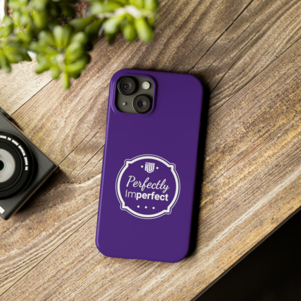 Perfectly Imperfect Purple Slim iPhone 15 Case on table